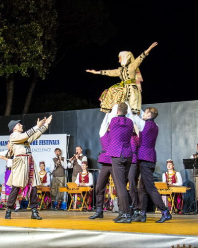 What does folklore festival “Two steps to Venice” Italy offer?